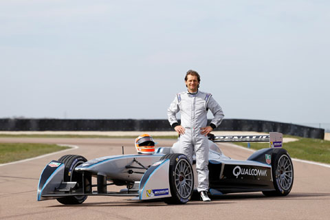 3. Italian Jarno Trulli beside the Formula E car