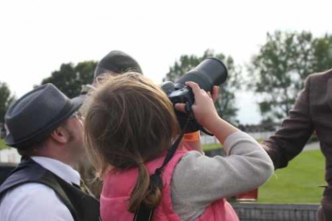 Look dad a plane I want your camera