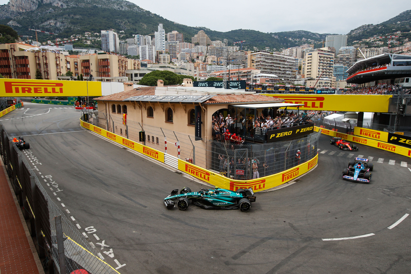 Fernando Alonso, Aston Martin AMR23, leads Esteban Ocon, Alpine A523, and Carlos Sainz, Ferrari SF-23