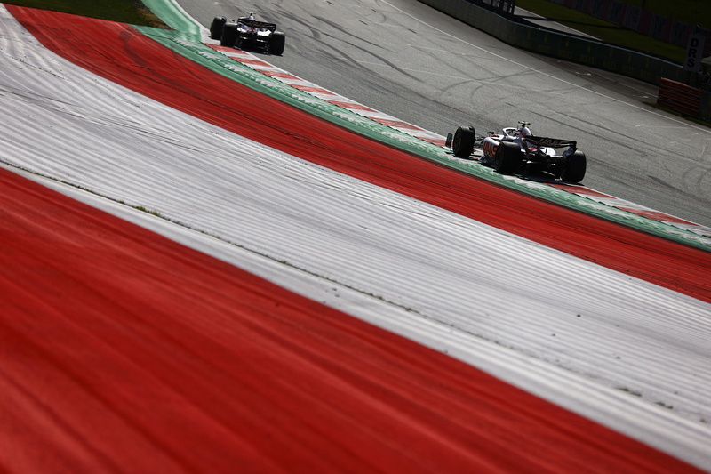 RED BULL RING, AUSTRIA - JULY 09: Kevin Magnussen, Haas VF-22, leads Mick Schumacher, Haas VF-22 during the Austrian GP at Red Bull Ring on Saturday July 09, 2022 in Spielberg, Austria. (Photo by Andy Hone / LAT Images)