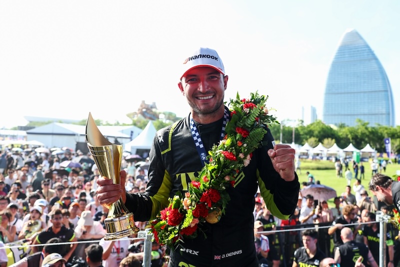 SANYA, CHINA - JUNE 20: Race winner Jake Dennis of Great Britain and Andretti Formula E celebrates on the podium during the Sanya E-Prix, Round 11 of the 2026 FIA Formula E World Championship at Sanya Street Circuit on June 20, 2026 in Sanya, China. (Photo by Simon Galloway/LAT Images)