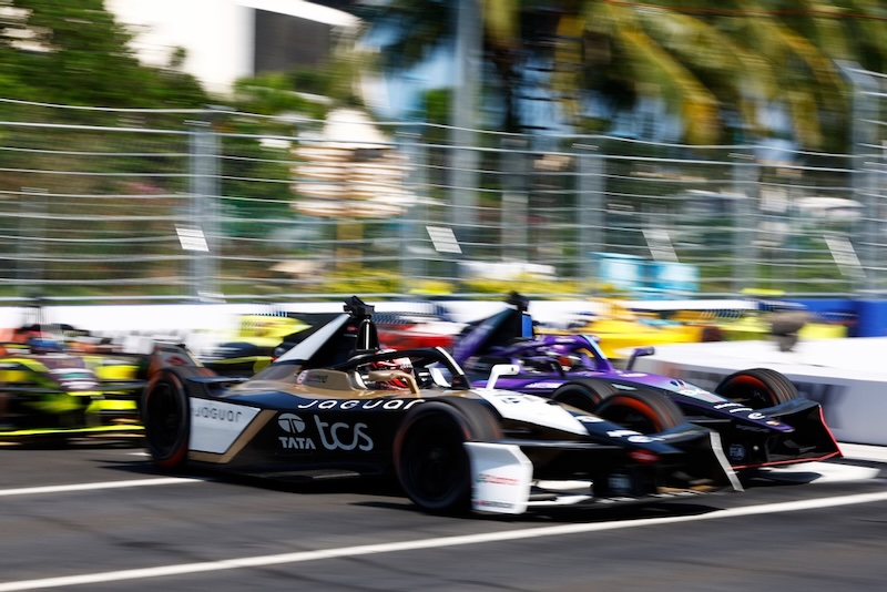 SANYA, CHINA - JUNE 20: Mitch Evans of New Zealand driving the (9) Jaguar TCS Racing Jaguar I-TYPE 7 battles with Pascal Wehrlein of Germany driving the (94) Porsche Formula E Team Porsche 99X Electric during the Sanya E-Prix, Round 11 of the 2026 FIA Formula E World Championship at Sanya Street Circuit on June 20, 2026 in Sanya, China. (Photo by Jordan McKean/LAT Images)